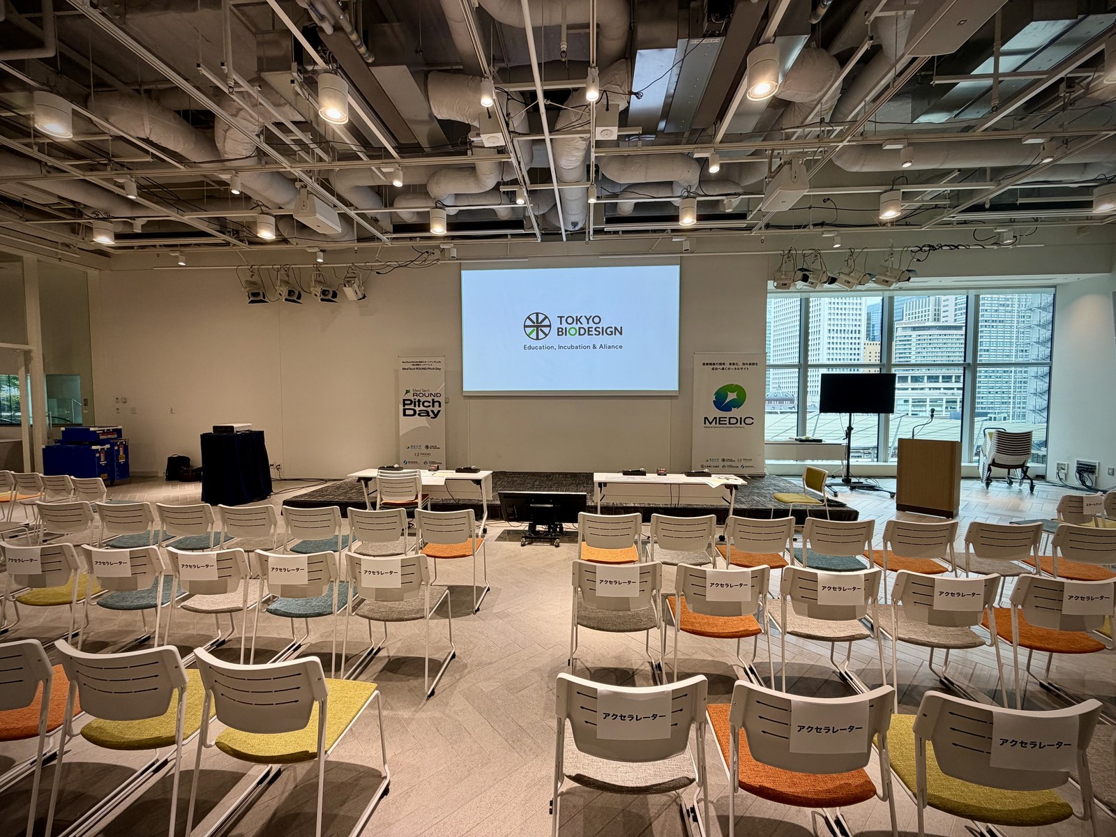The event space at Tokyo Midtown Yaesu, set for the pitch day, looking out over Tokyo Station.